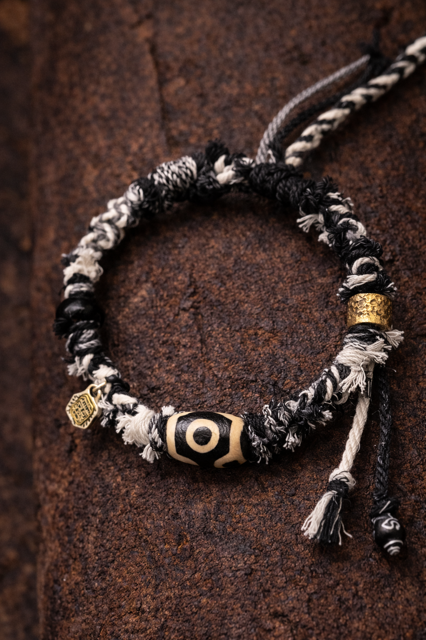 Wealth Vision Three-Eye Dzi Bead Tibetan Cord Bracelet