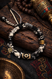 Wealth Vision Three-Eye Dzi Bead Tibetan Cord Bracelet