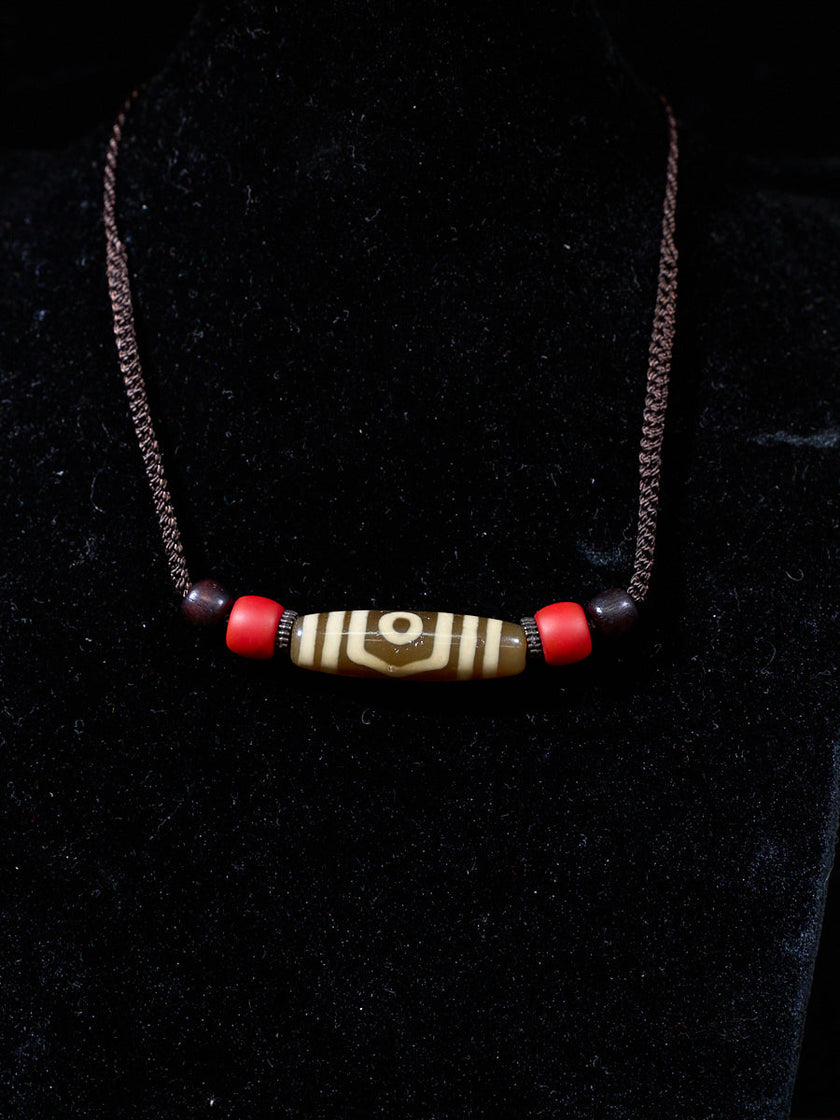 Three-Eyed Dzi Bead Necklace – Tibetan Symbol of Protection & Spiritual Balance