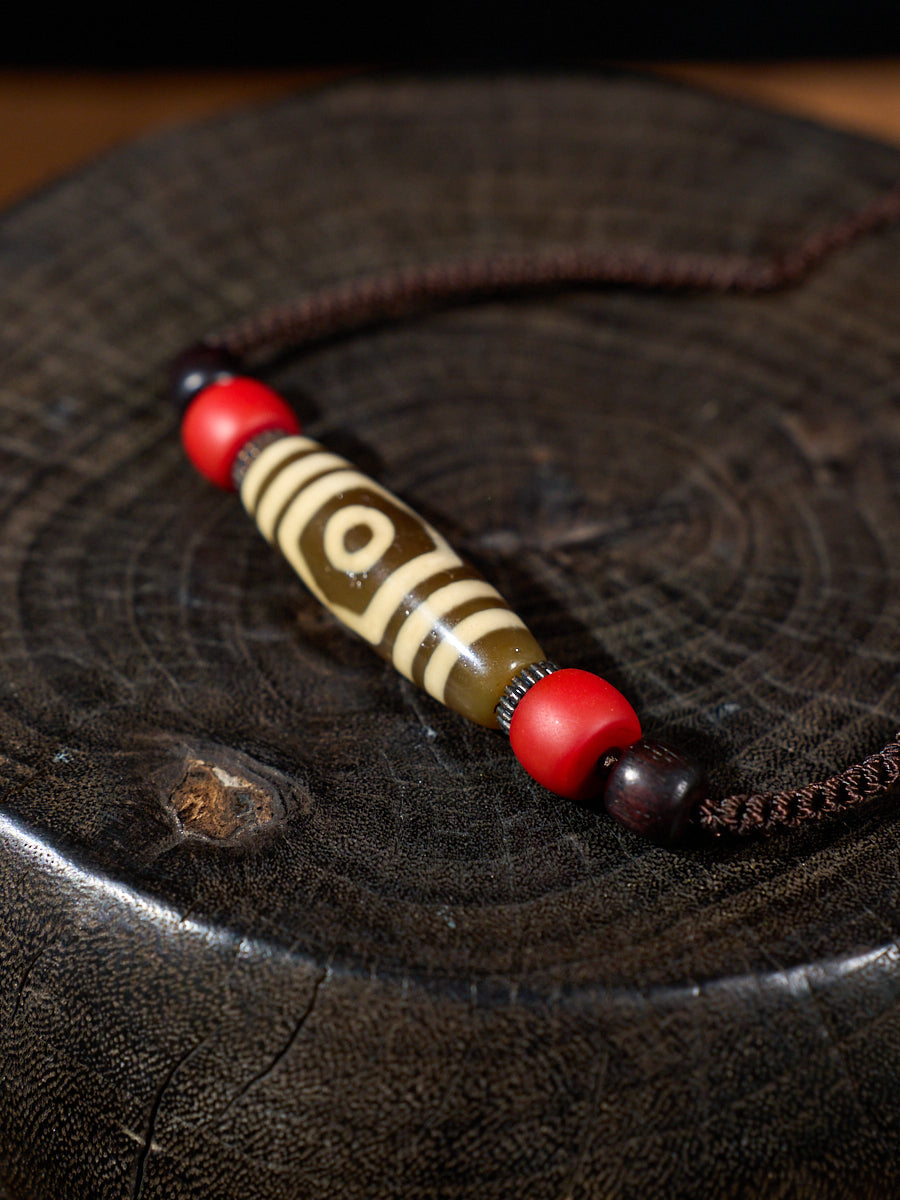 Three-Eyed Dzi Bead Necklace – Tibetan Symbol of Protection & Spiritual Balance