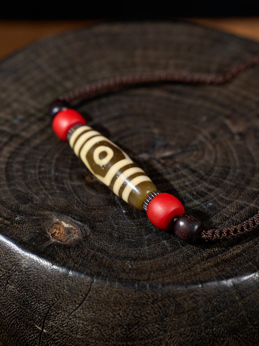 Three-Eyed Dzi Bead Necklace – Tibetan Symbol of Protection & Spiritual Balance
