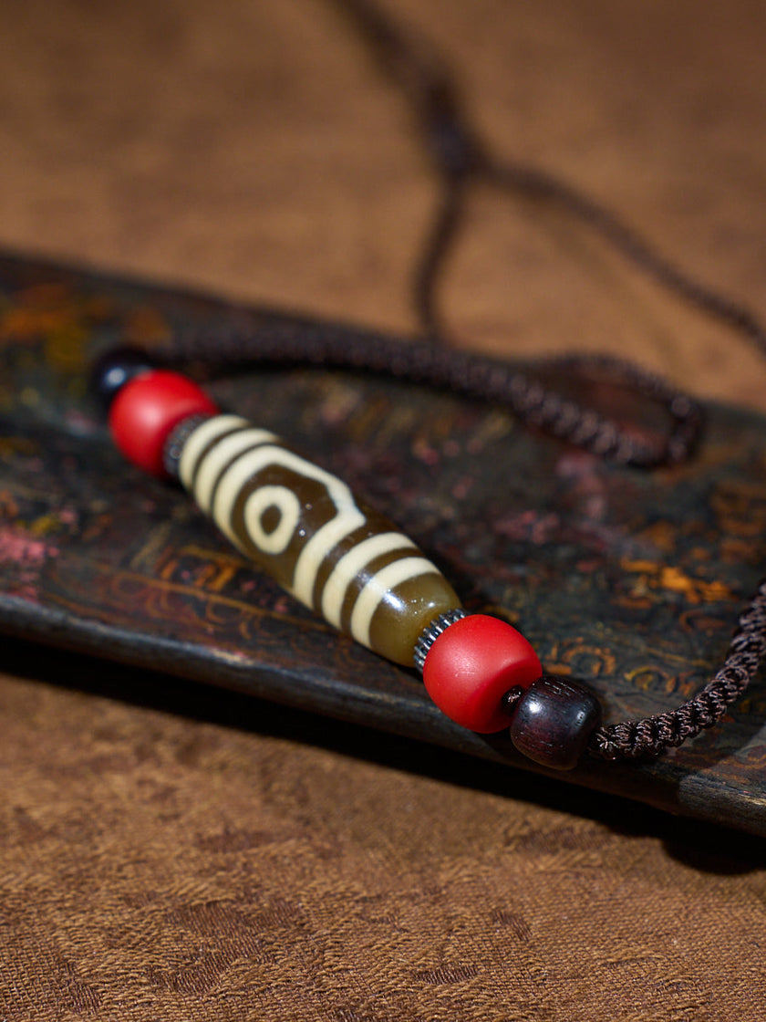 Three-Eyed Dzi Bead Necklace – Tibetan Symbol of Protection & Spiritual Balance