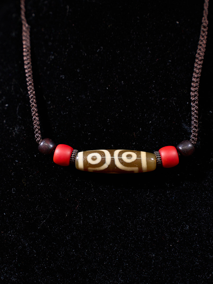 Three-Eyed Dzi Bead Necklace – Tibetan Symbol of Protection & Spiritual Balance
