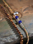 Wire Wrapped Clear Quartz Lapis Lazuli Wood Bead Necklace