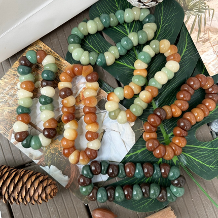 Garlic Clove Bodhi · Multicolored Bead Bracelet — 14mm. Ground. Release. Return.