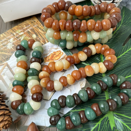 Garlic Clove Bodhi · Multicolored Bead Bracelet — 14mm. Ground. Release. Return.