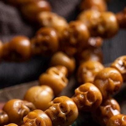 Handcrafted Yak Bone Skull Mala Bracelet: Tibetan Prayer Beads