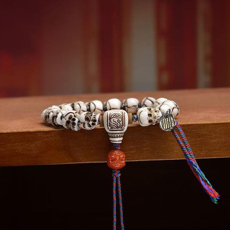 Tibetan Yak Bone Skull Bracelet, Single Strand Mala with Agate Bead