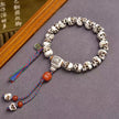 Tibetan Yak Bone Skull Bracelet, Single Strand Mala with Agate Bead